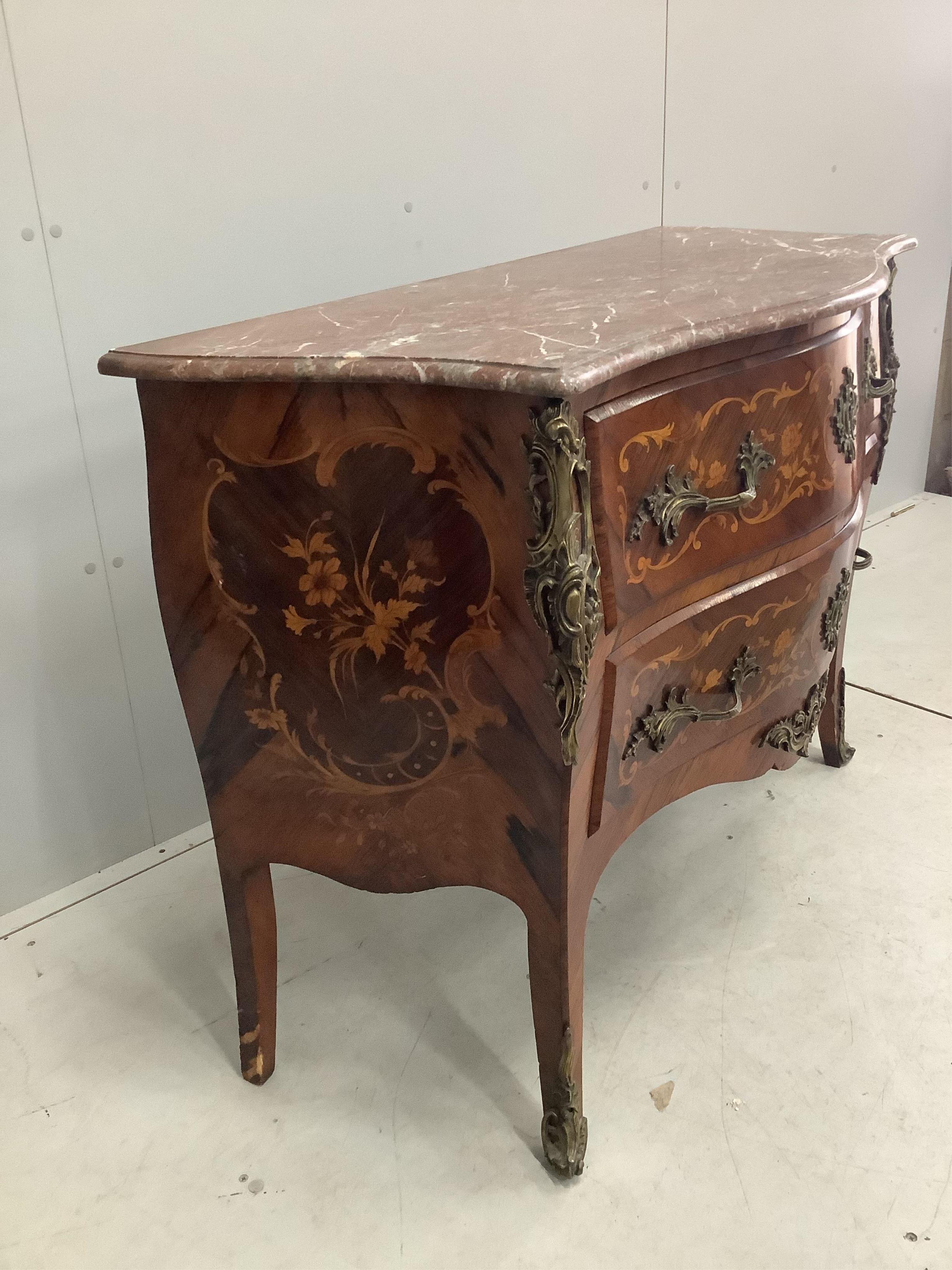 A French gilt metal mounted and marquetry inlaid kingwood marble topped serpentine commode, width 116cm, depth 51cm, height 85cm. Condition - fair to good